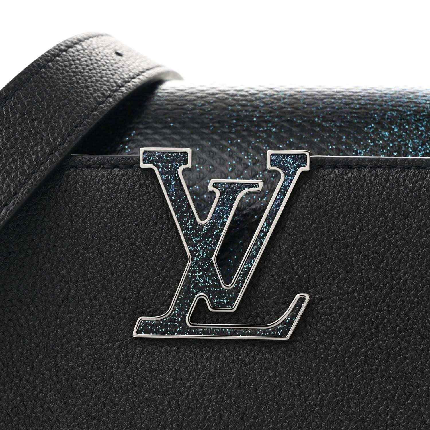 Black leather handbag with metallic LV logo on front flap and textured trim