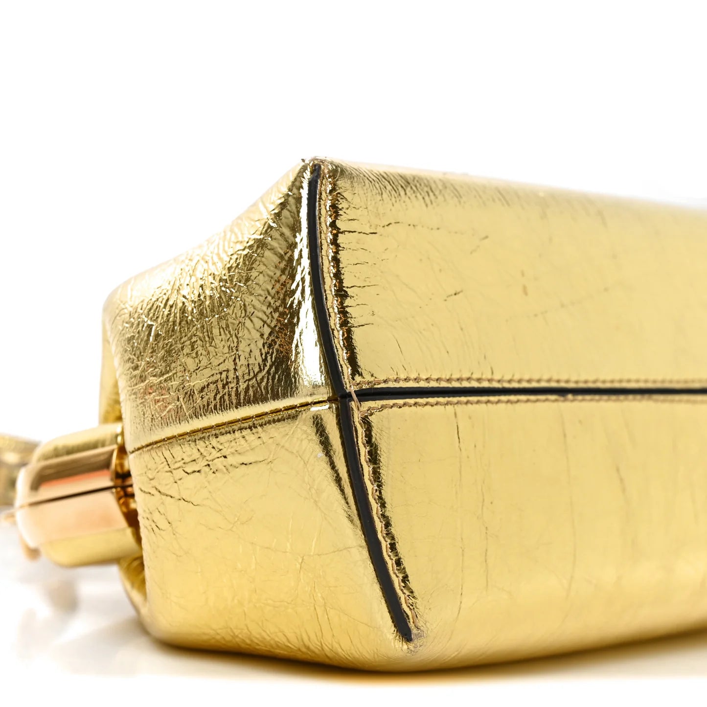 Metallic gold mini shoulder bag with curved flap and leather strap