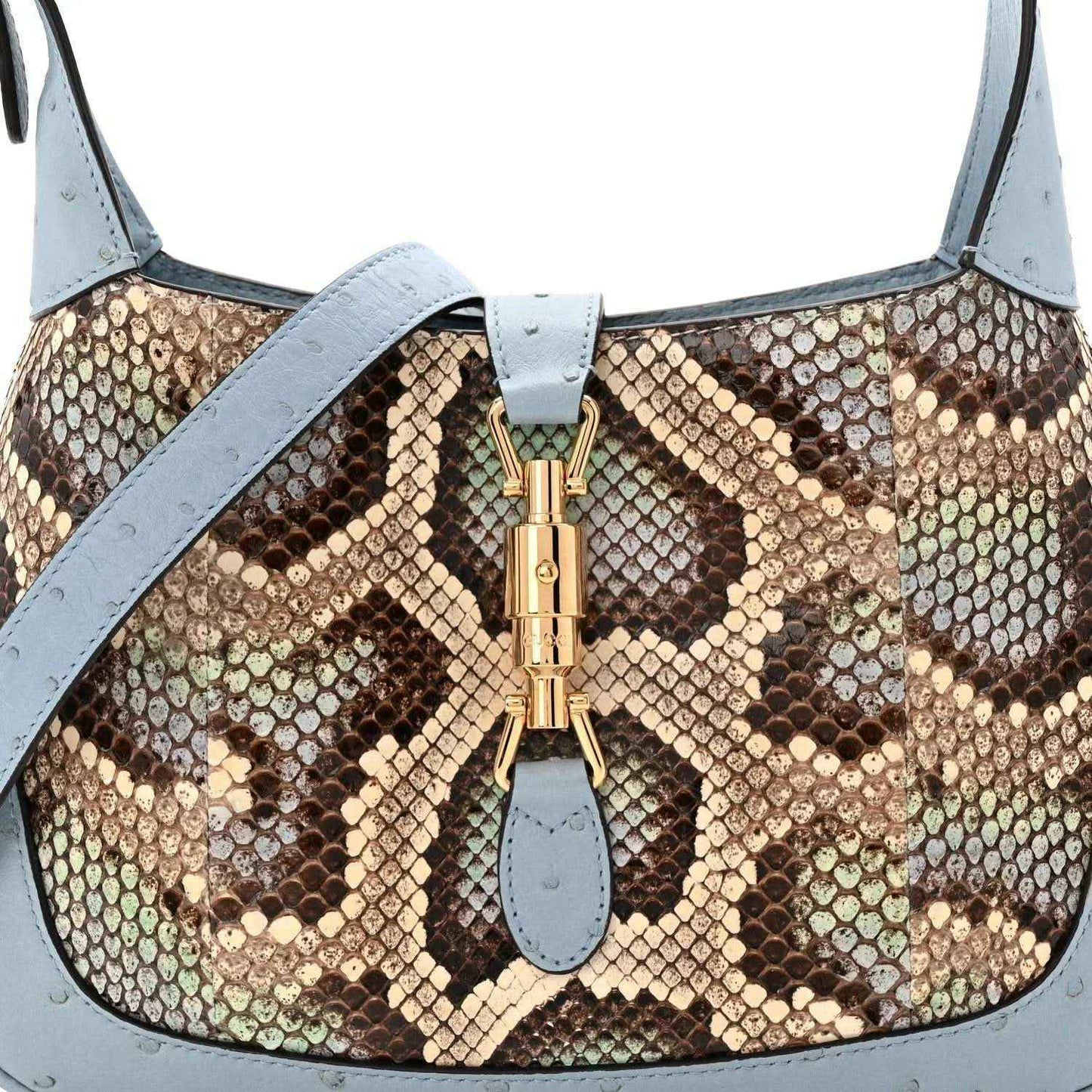 Small hobo bag top front with snakeskin pattern, gold clasp, and light blue handles