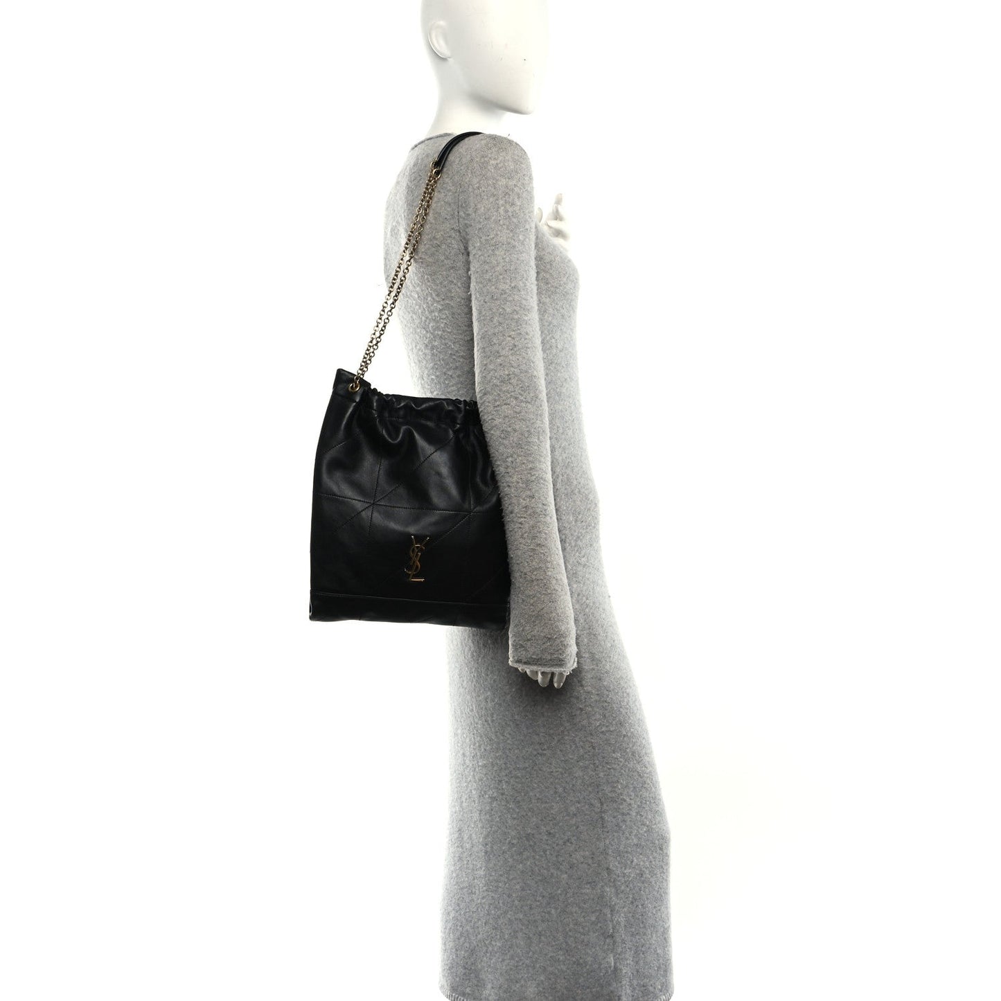 Black quilted leather shoulder bag on chain strap, side profile