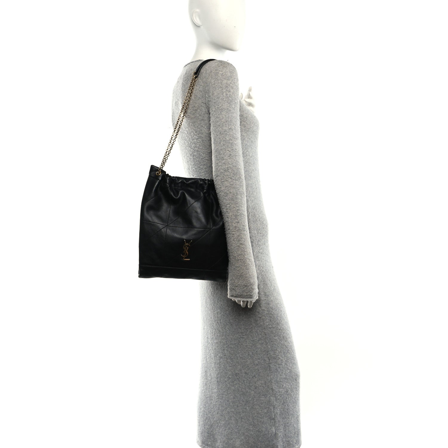 Black quilted leather shoulder bag on chain strap, side profile