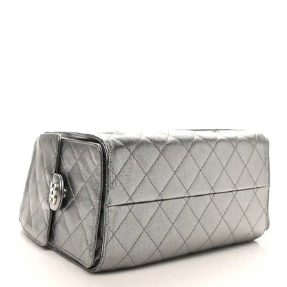 Chanel metallic quilted small handbag with front flap and side pocket