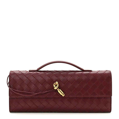 Burgundy Intrecciato nappa clutch bag with top handle and gold clasp