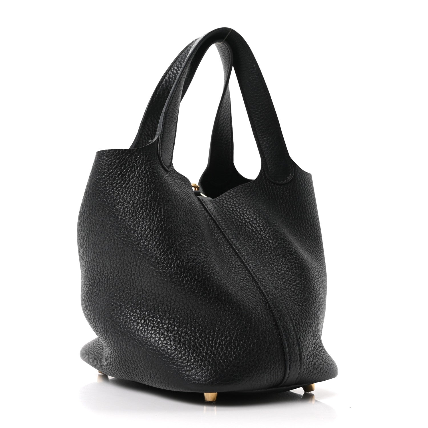 Black pebbled leather tote bag in three-quarter view with slouchy shape and handles