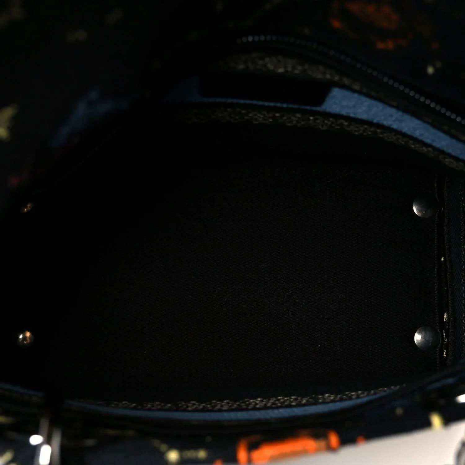 Black fabric interior with side wall and metal snap hardware