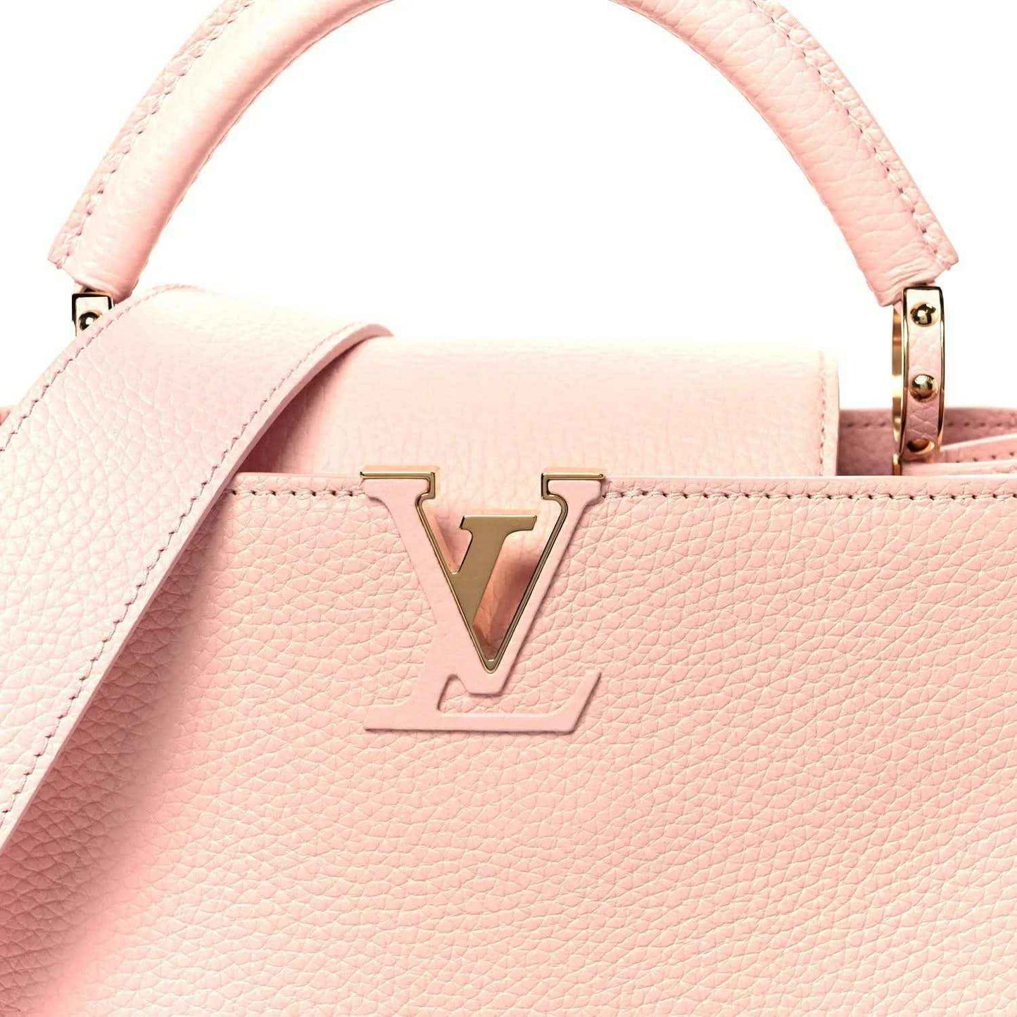 Louis Vuitton Capucines BB shoulder bag close-up of rose pebbled leather LV emblem and handle
