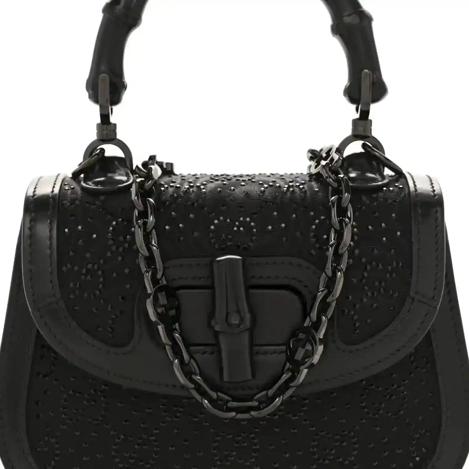 Black mini handbag with bamboo-style handle, chain strap, and front clasp detail.