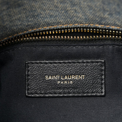 Denim satchel inner label with gold zipper and SAINT LAURENT PARIS branding