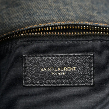 Denim satchel inner label with gold zipper and SAINT LAURENT PARIS branding
