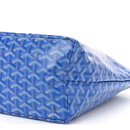 Sky blue patterned tote bag with zip top and leather trim
