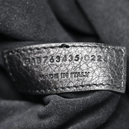 Black leather Bea tote label with size code and “MADE IN ITALY”