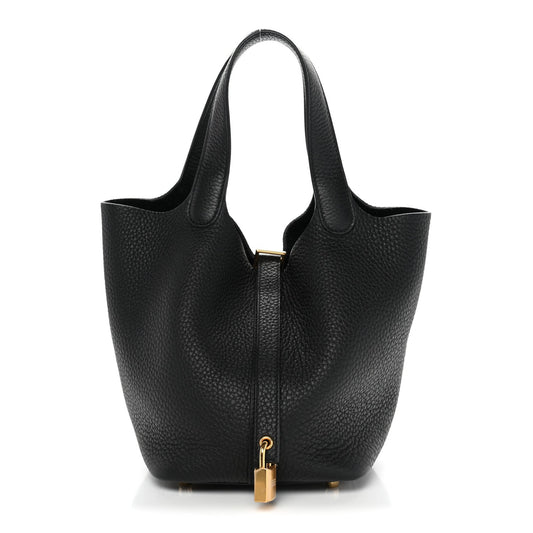 Black textured leather tote bag with gold lock and top handles