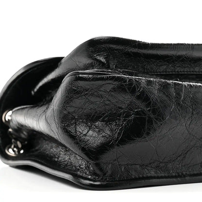 Black crinkled calfskin medium satchel corner with silver hardware ring