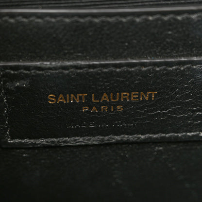 Grain-textured satchel lining with SAINT LAURENT PARIS stamp