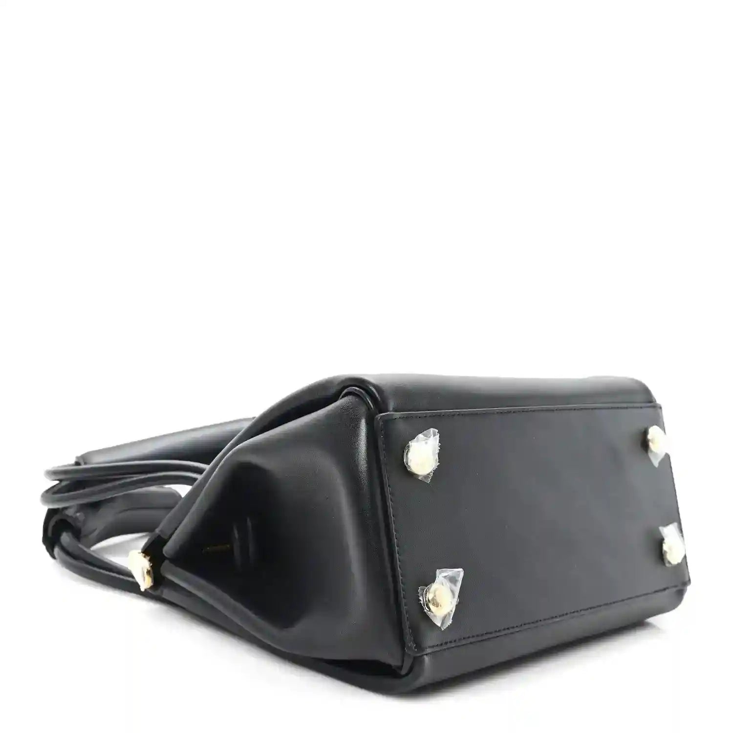 Small black leather handbag with side studs and top handles