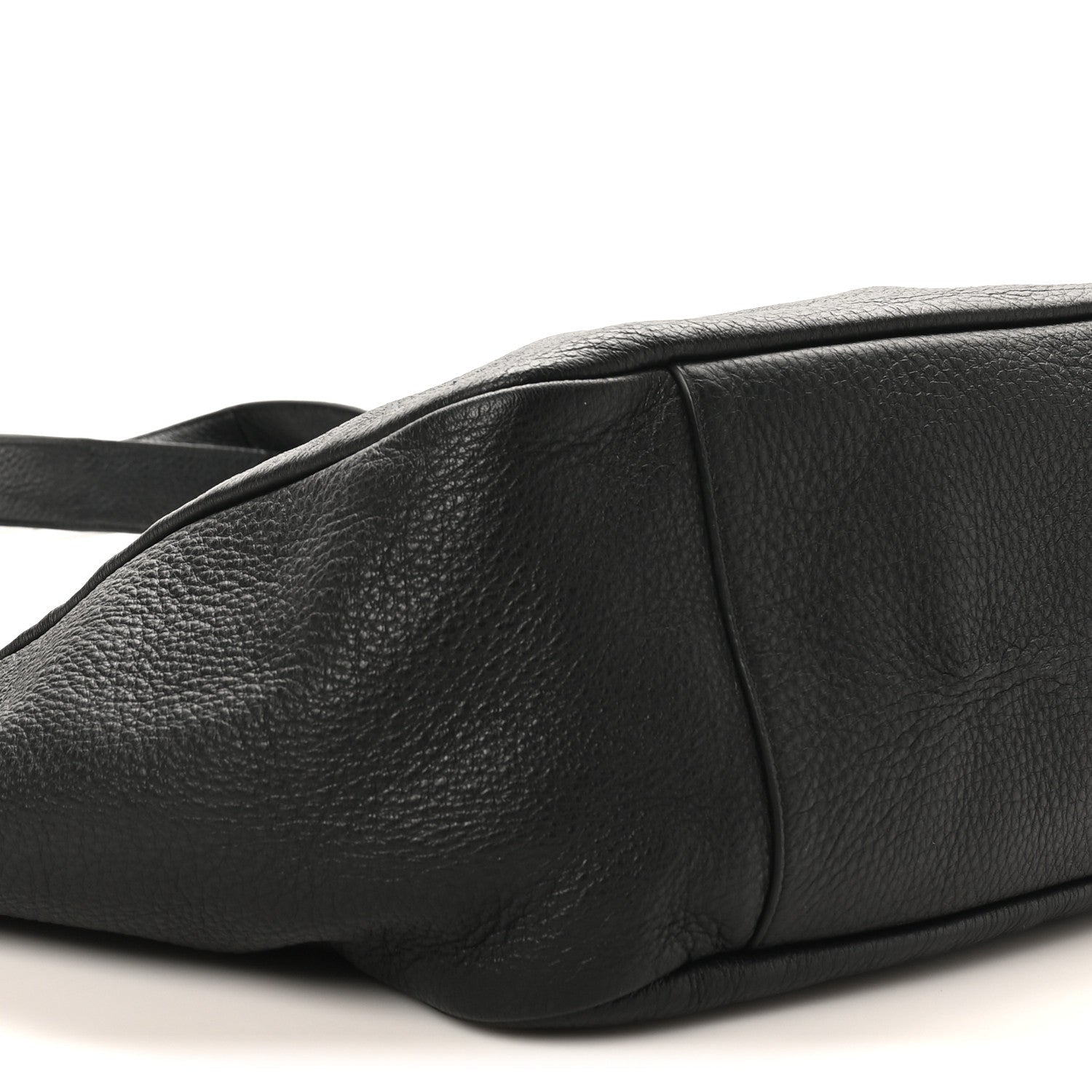 Black grained deerskin Bea tote side view with curved panel and shoulder strap