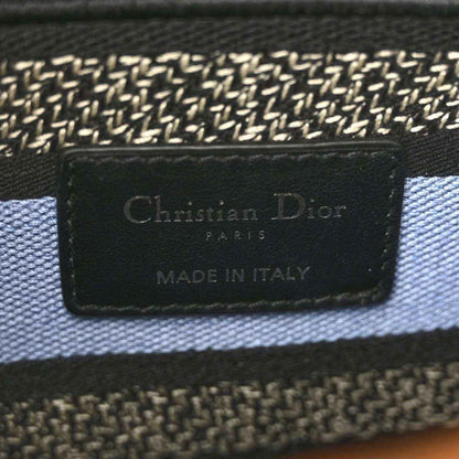 Interior fabric label reading Christian Dior, PARIS, and MADE IN ITALY