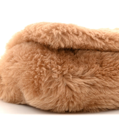 Saint Laurent shearling satchel with light brown plush texture, folded edge detail