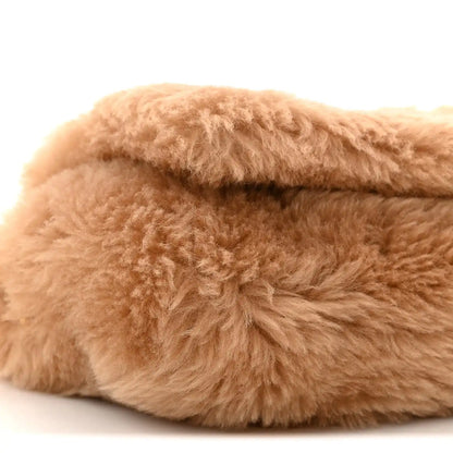 Saint Laurent shearling satchel with light brown plush texture, folded edge detail