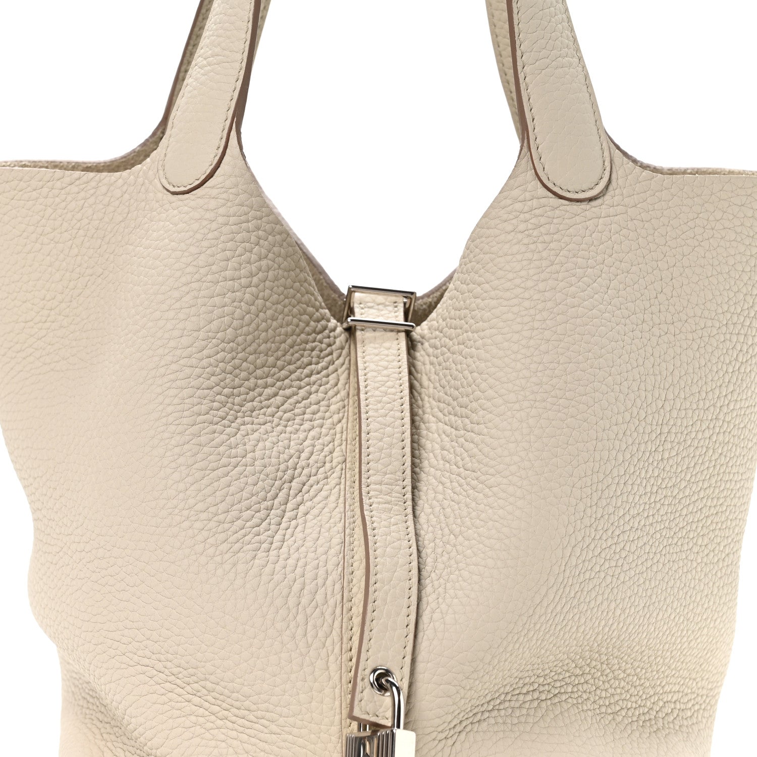 Ivory leather tote bag with top zipper and metal pull clasp