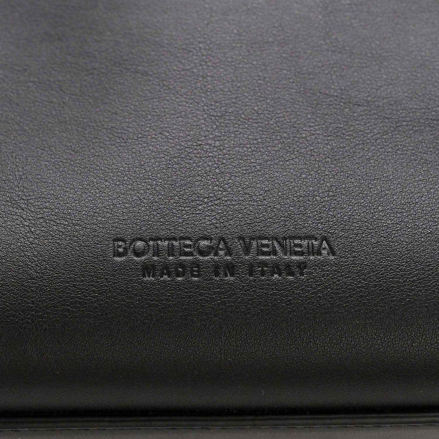 Bottega Veneta logo stamped on black leather lining