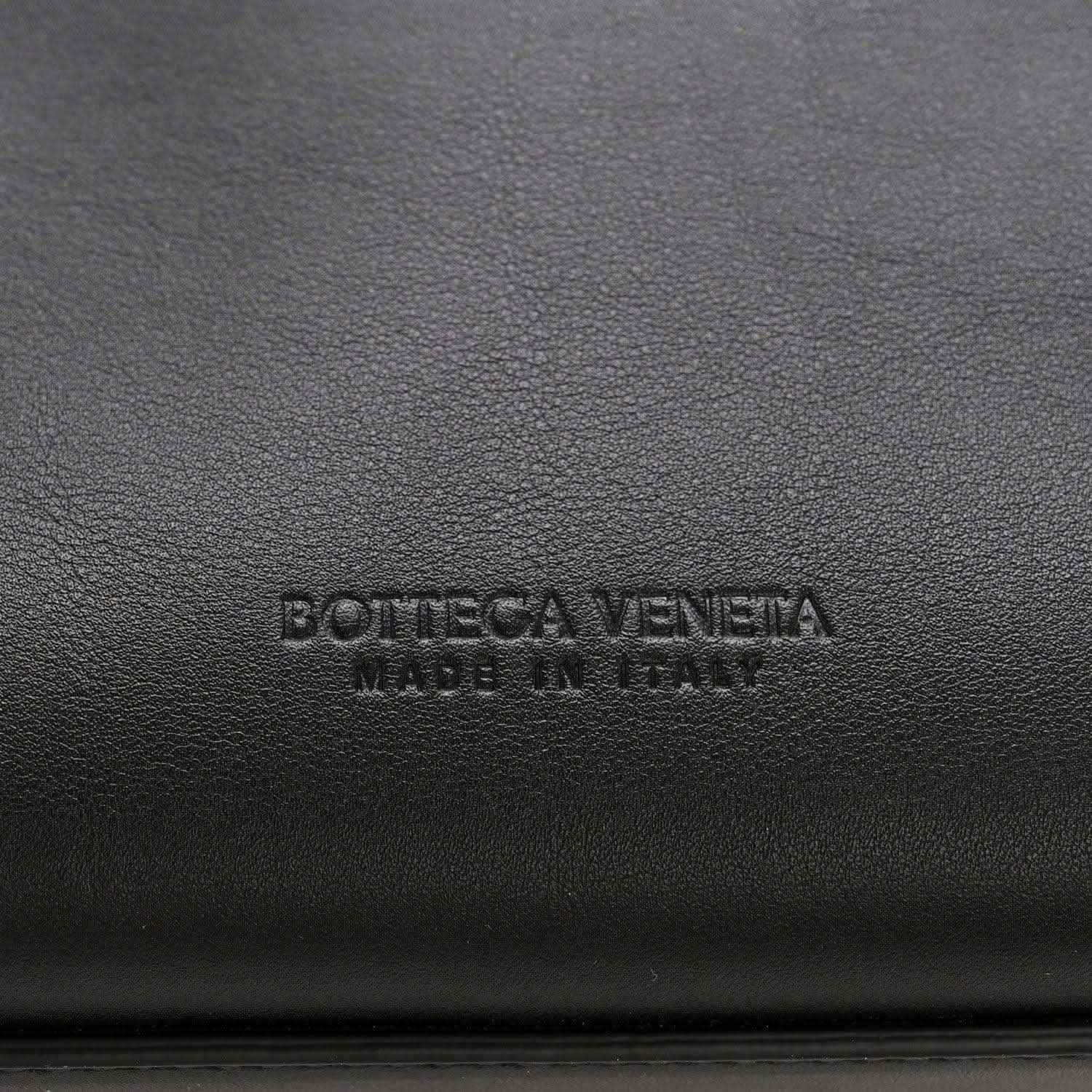 Bottega Veneta logo stamped on black leather lining