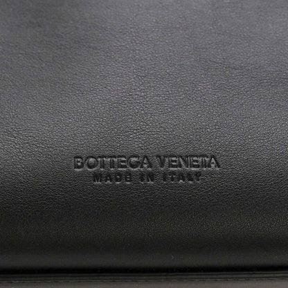 Bottega Veneta logo stamped on black leather lining