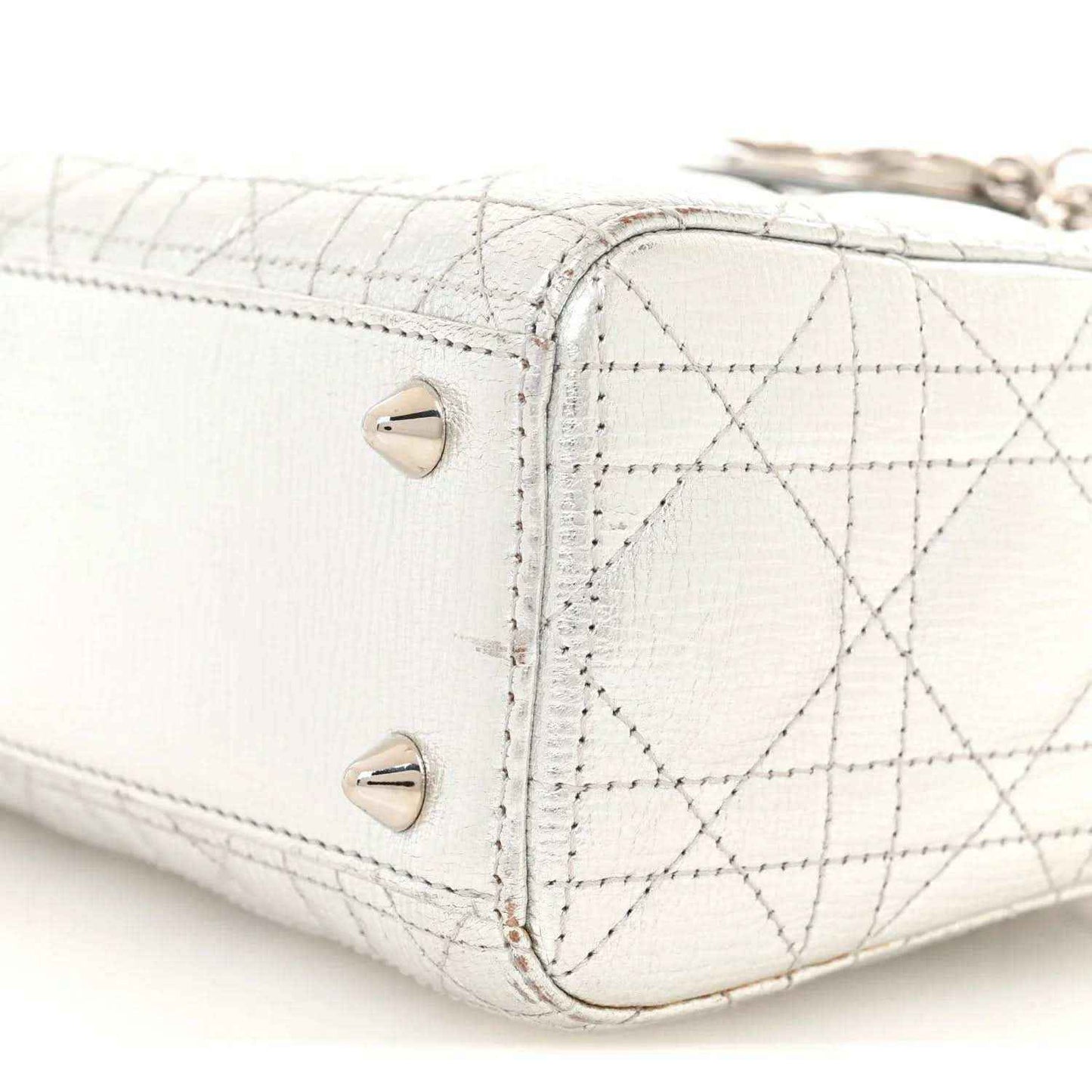 My Lady Dior handbag corner with quilted lattice, two snap studs and stitched edge