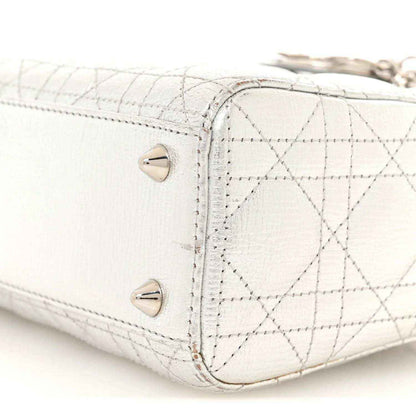 My Lady Dior handbag corner with quilted lattice, two snap studs and stitched edge