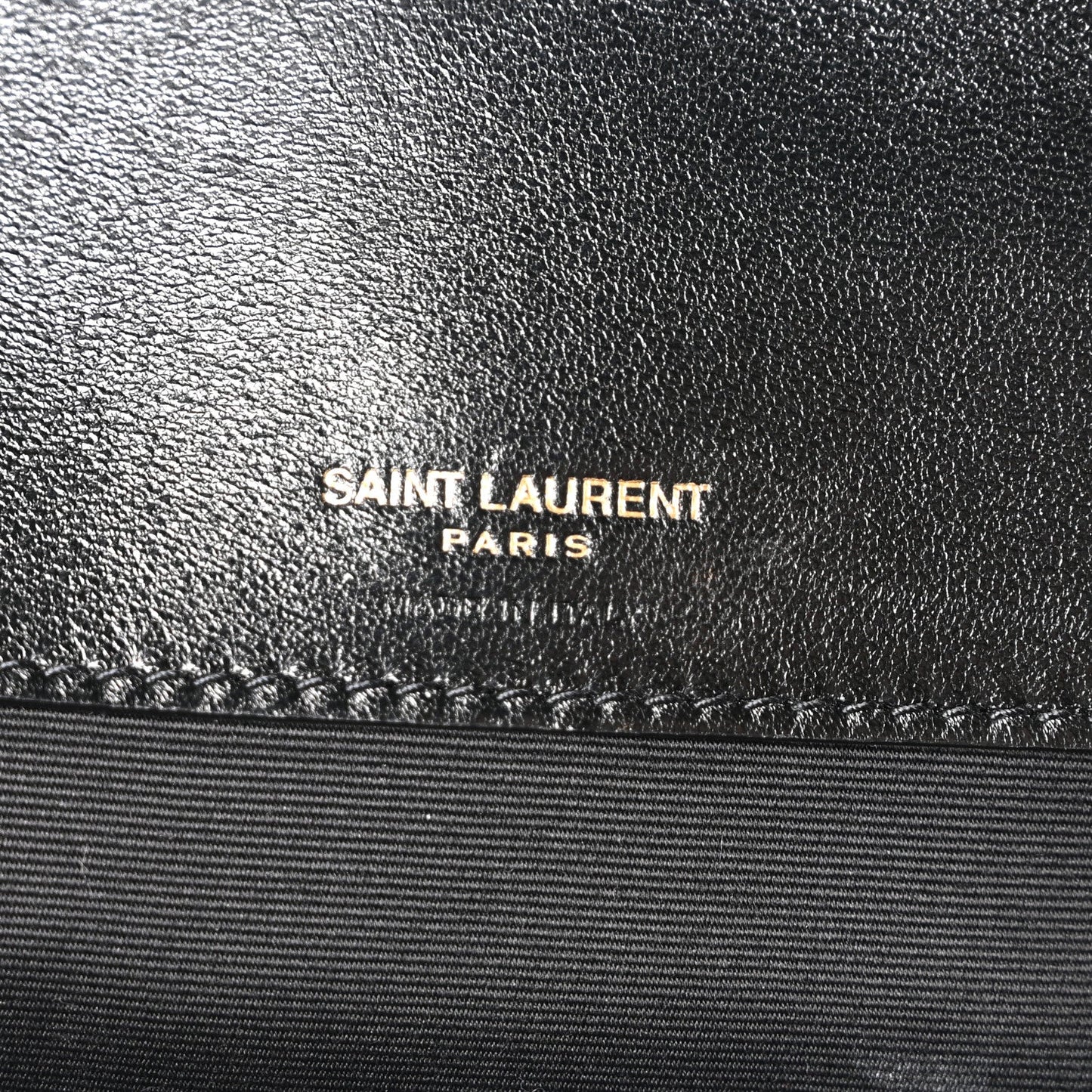 Black leather lining with Saint Laurent Paris logo text