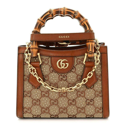Gucci mini tote bag with GG monogram canvas, tan and brown leather, chain strap.