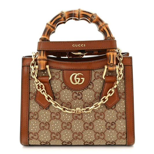 Gucci mini tote bag with GG monogram canvas, tan and brown leather, chain strap.