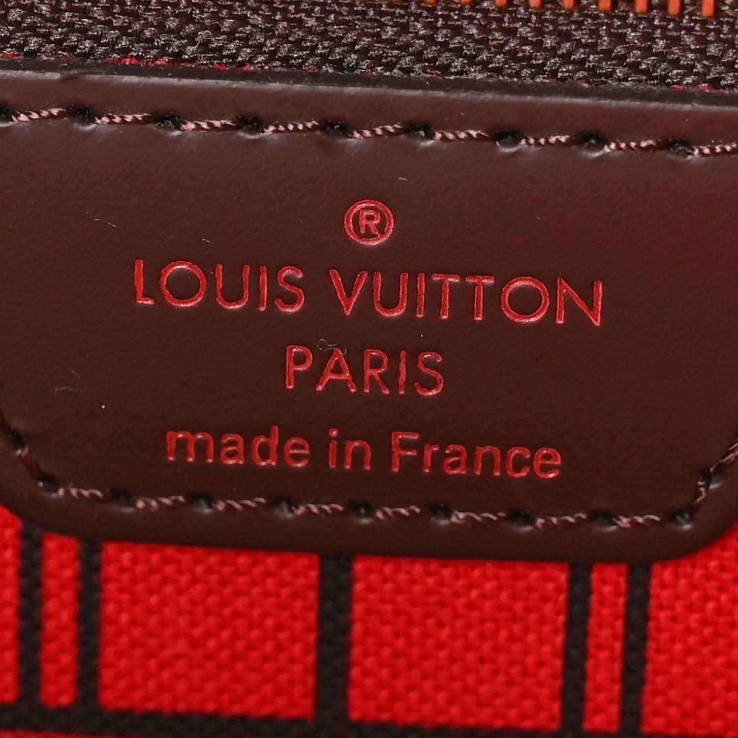 Louis Vuitton Paris leather patch with stitched edges and “made in France” text
