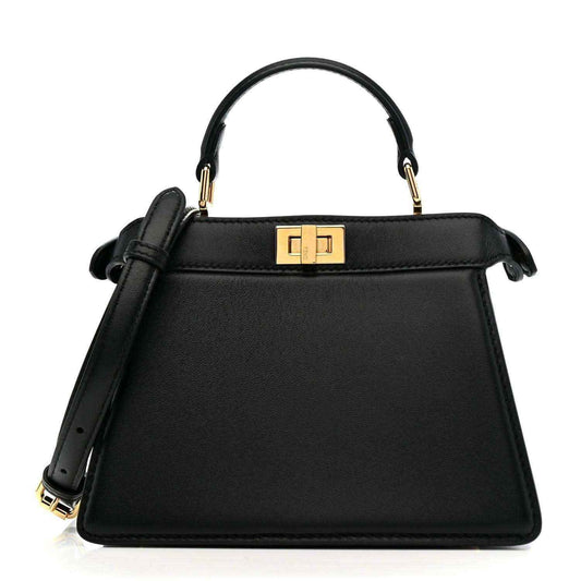 Black leather satchel with top handle and gold-toned clasp
