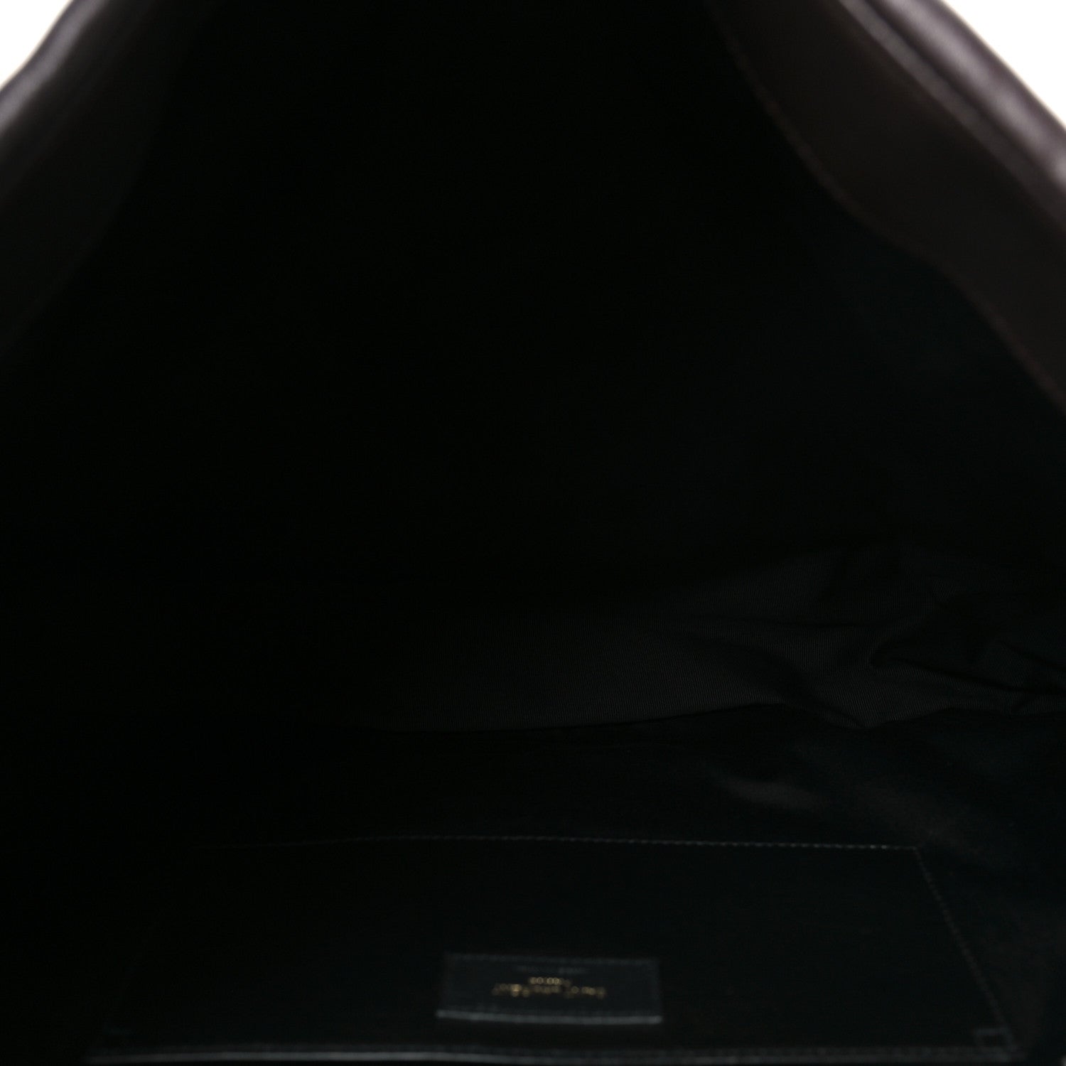 Saint Laurent shoulder bag interior lining with visible brand label on the base.