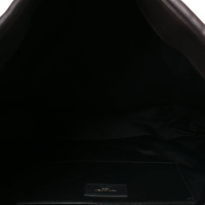Saint Laurent shoulder bag interior lining with visible brand label on the base.