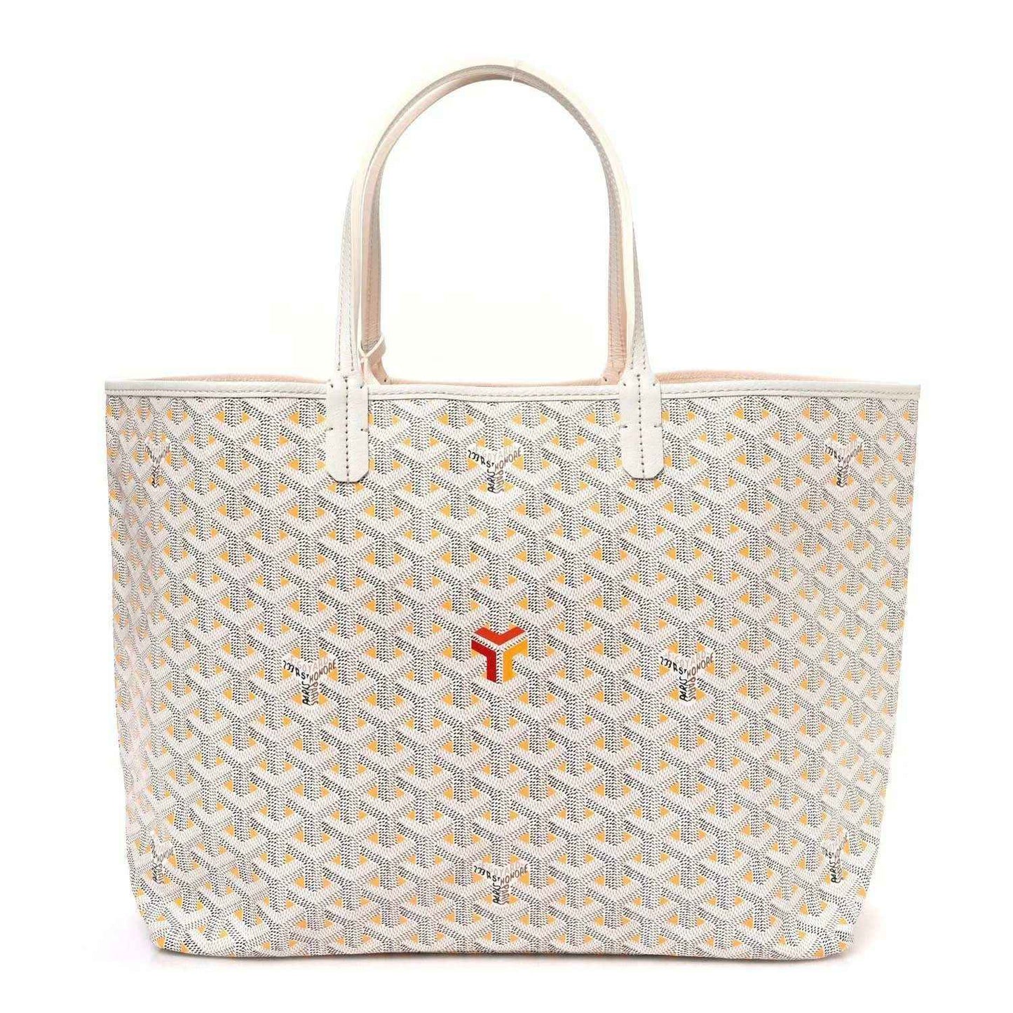 White tote bag with yellow Goyardine pattern, leather handles, and red logo accent at front