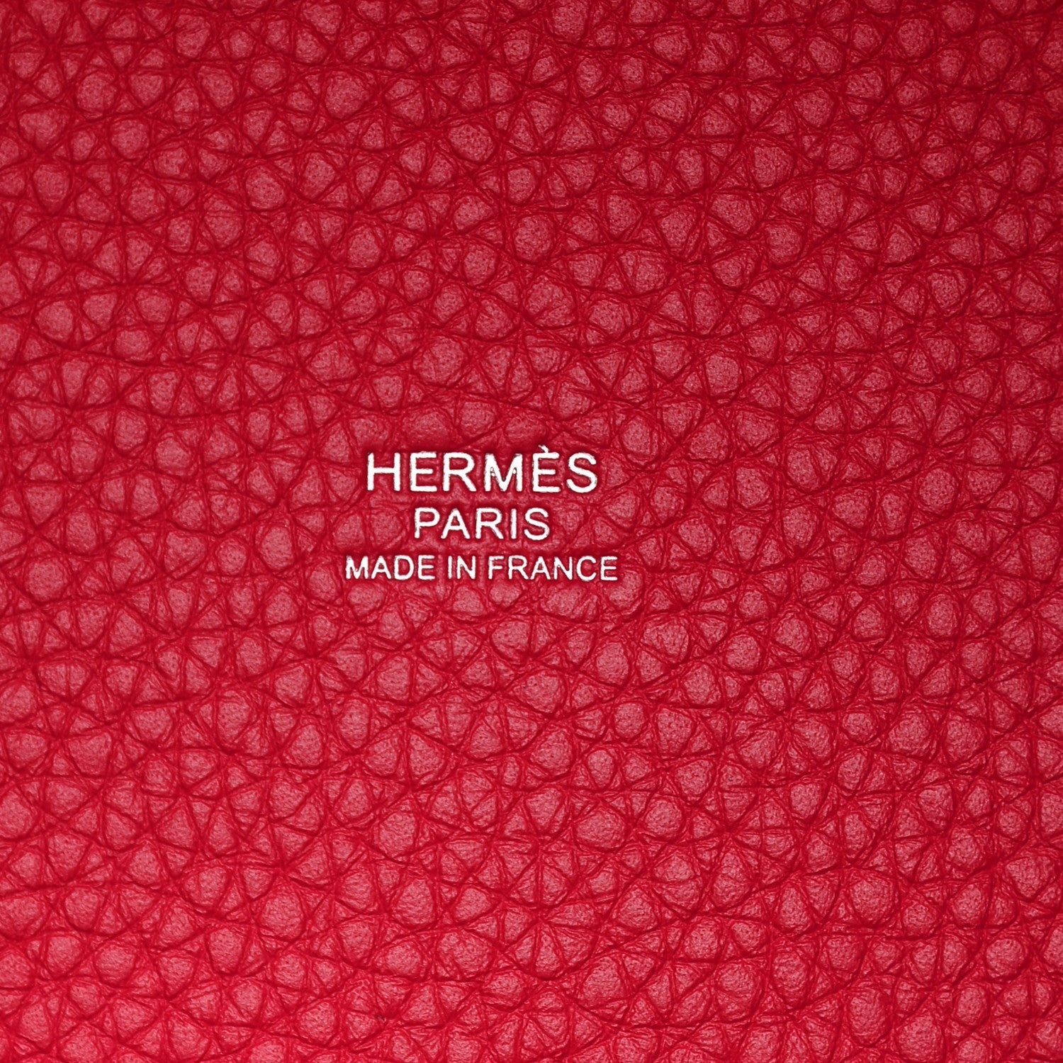 Red textured lining with embossed HERMÈS PARIS and MADE IN FRANCE