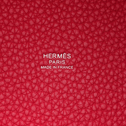 Red textured lining with embossed HERMÈS PARIS and MADE IN FRANCE