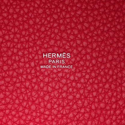 Red textured lining with embossed HERMÈS PARIS and MADE IN FRANCE
