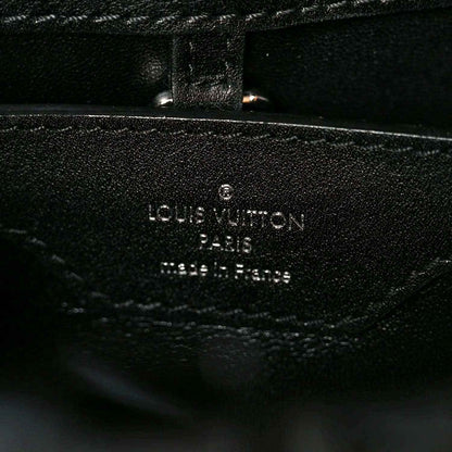 Louis Vuitton Paris made in France stamp on black leather lining with stitching