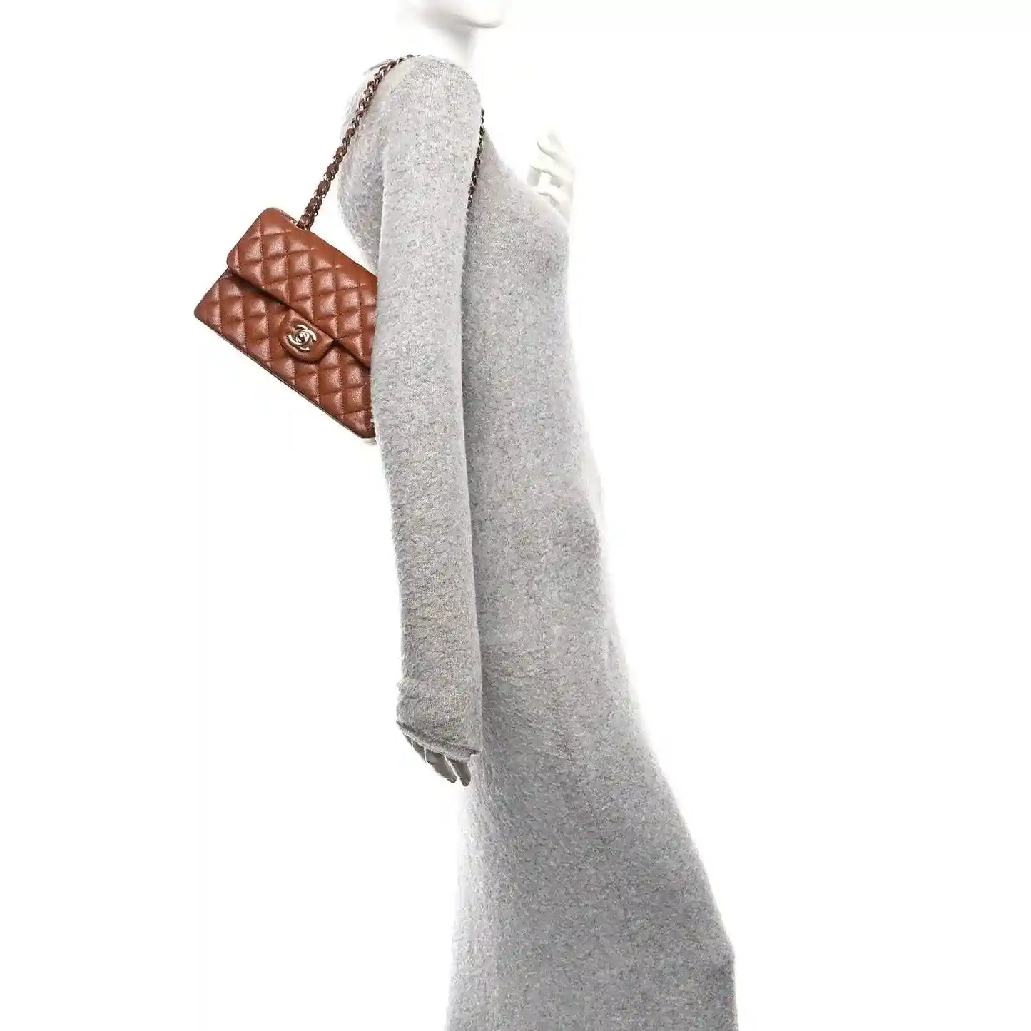 Chanel small quilted double flap bag in caramel leather with gold chain strap