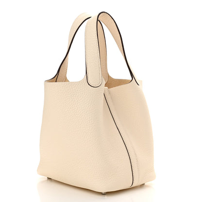 Nata leather tote handbag with top handles and structured silhouette
