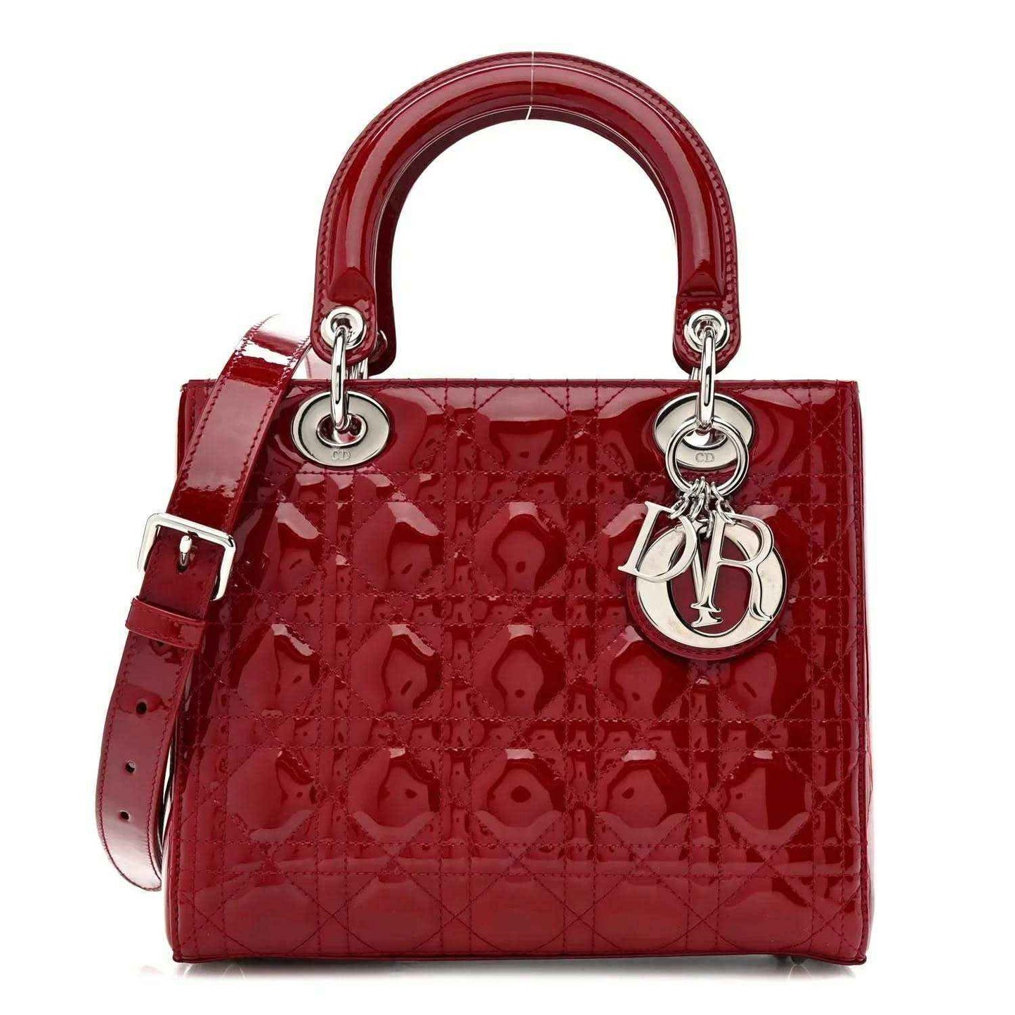 Red patent leather Lady Dior handbag with top handles and silver hardware.