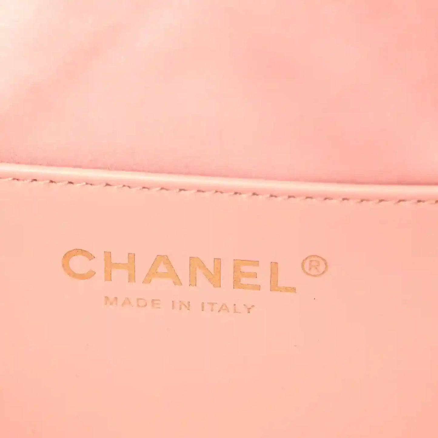 Chanel handbag interior label reading CHANEL and MADE IN ITALY