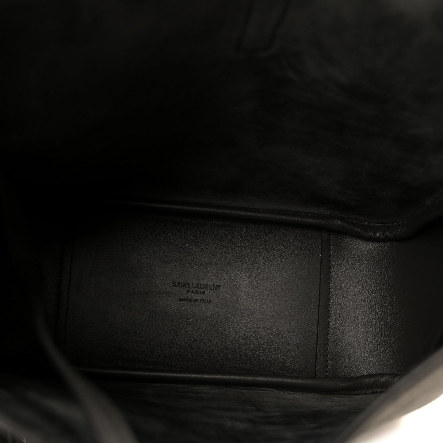 Black leather interior with stitched panel and zipper edge of the bag