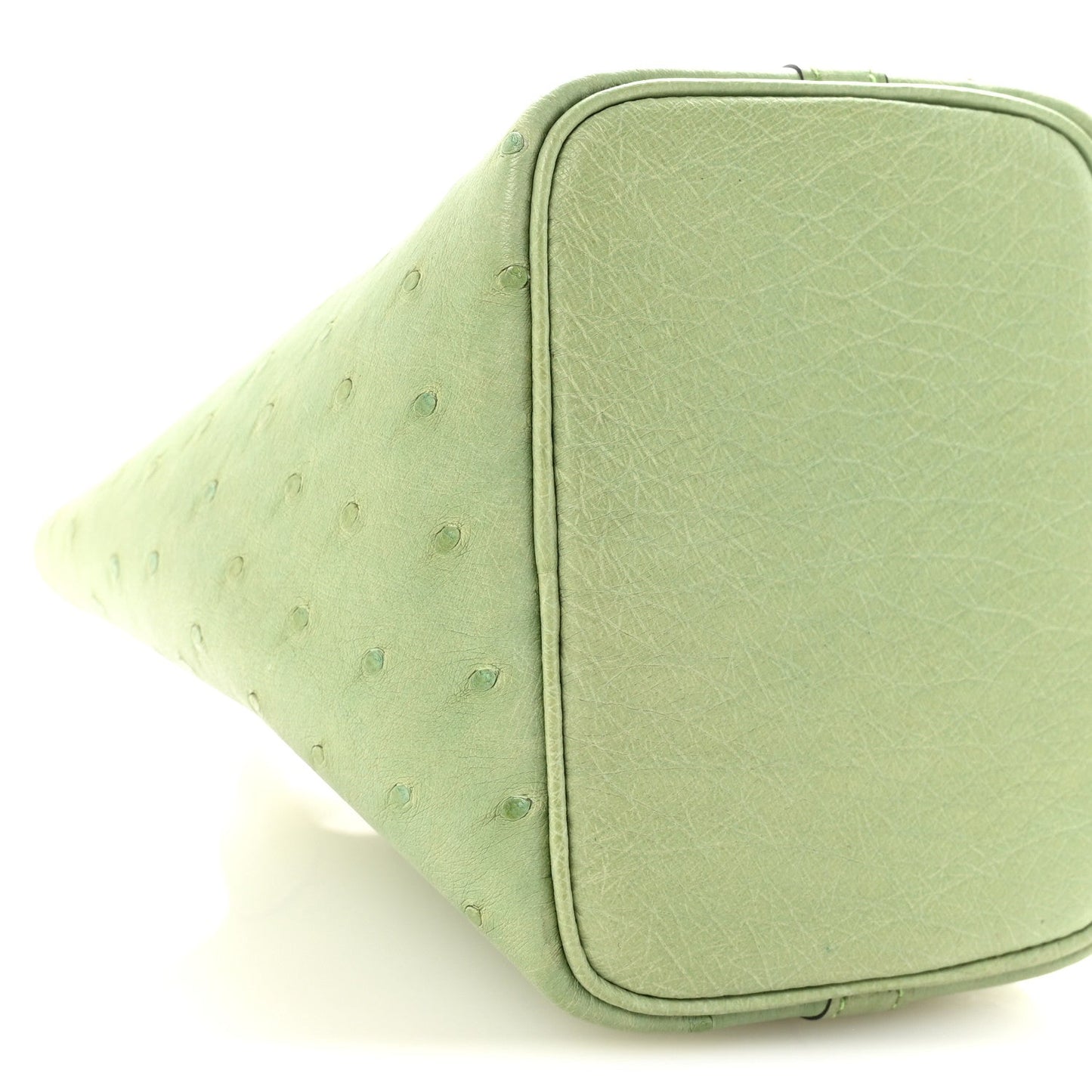 Green mini handbag end with rectangular panel and rounded edge trim