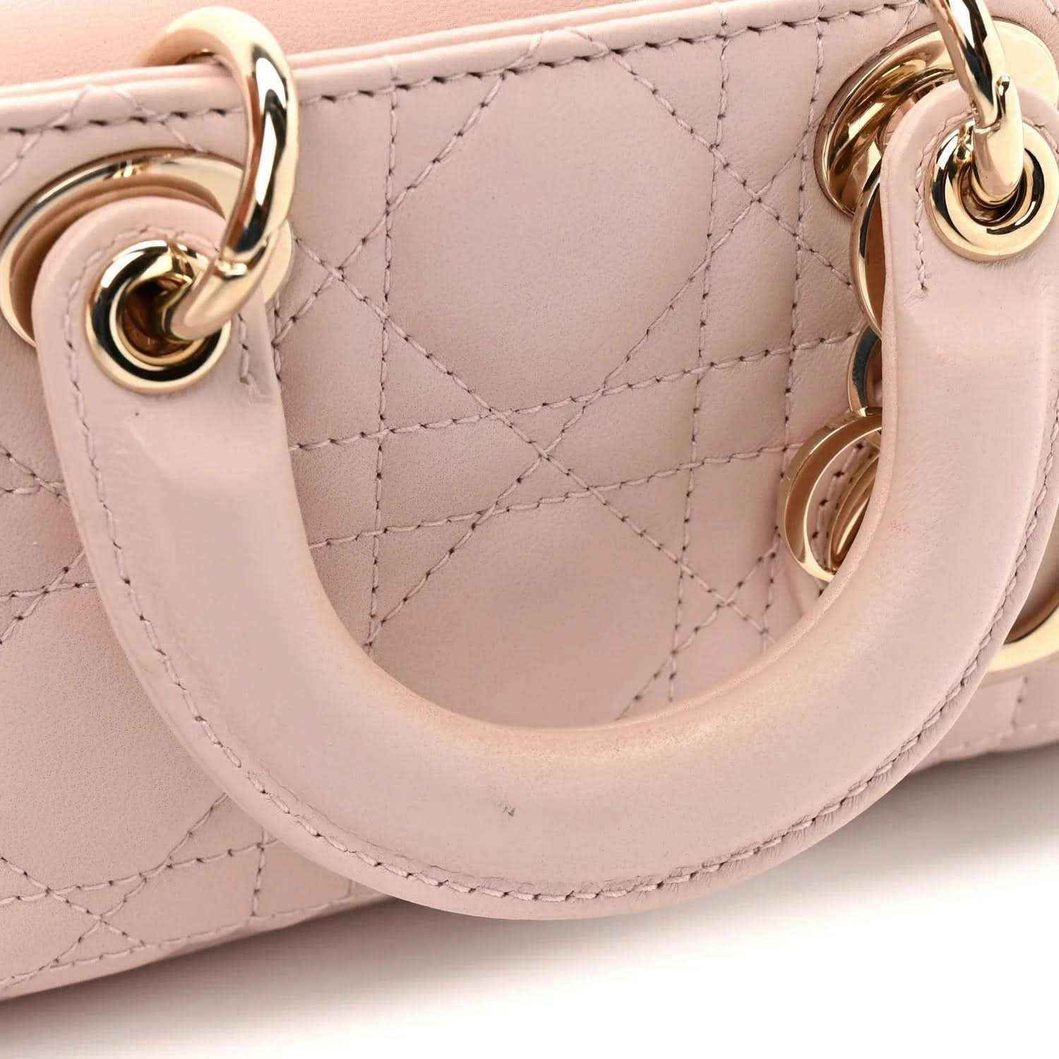 Powder pink cannage quilted lambskin micro bag with gold-tone rings and trim