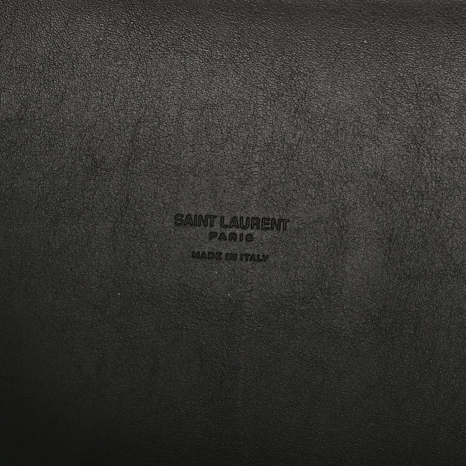 Leather hobo bag exterior with embossed Saint Laurent Paris logo text