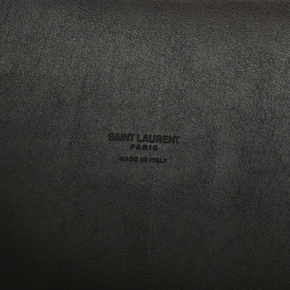 Leather hobo bag exterior with embossed Saint Laurent Paris logo text